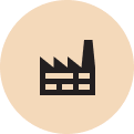 Black factory icon on an orange circle background.